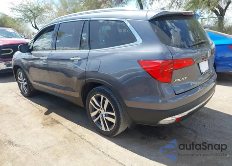 2018 Honda Pilot Touring from USA, damaged, VIN 5FNYF5H99JB021983
